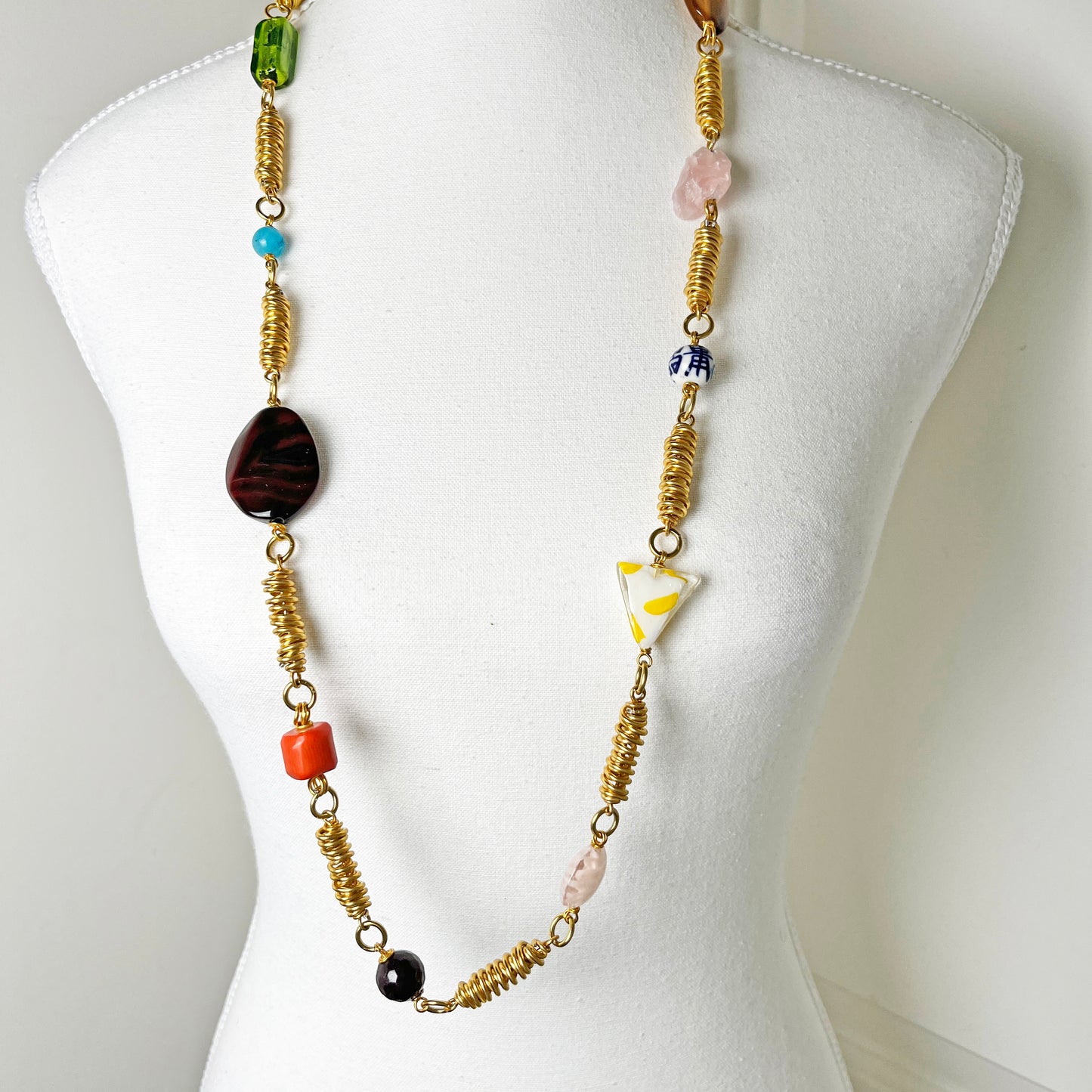 Gold-Toned Cocoon Necklace with Multicolored Stones and Beads